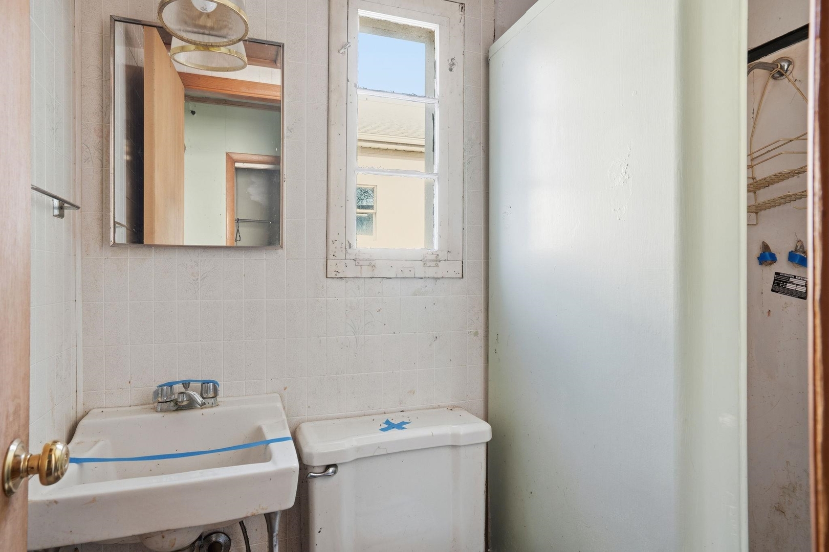 5029 69th Avenue Milan, IL 61264 - Photo 14 of 25 a bathroom with a sink toilet and mirror