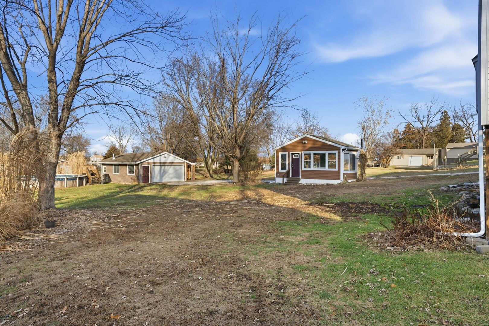5029 69th Avenue Milan, IL 61264 - Photo 18 of 25 a view of house with outdoor space