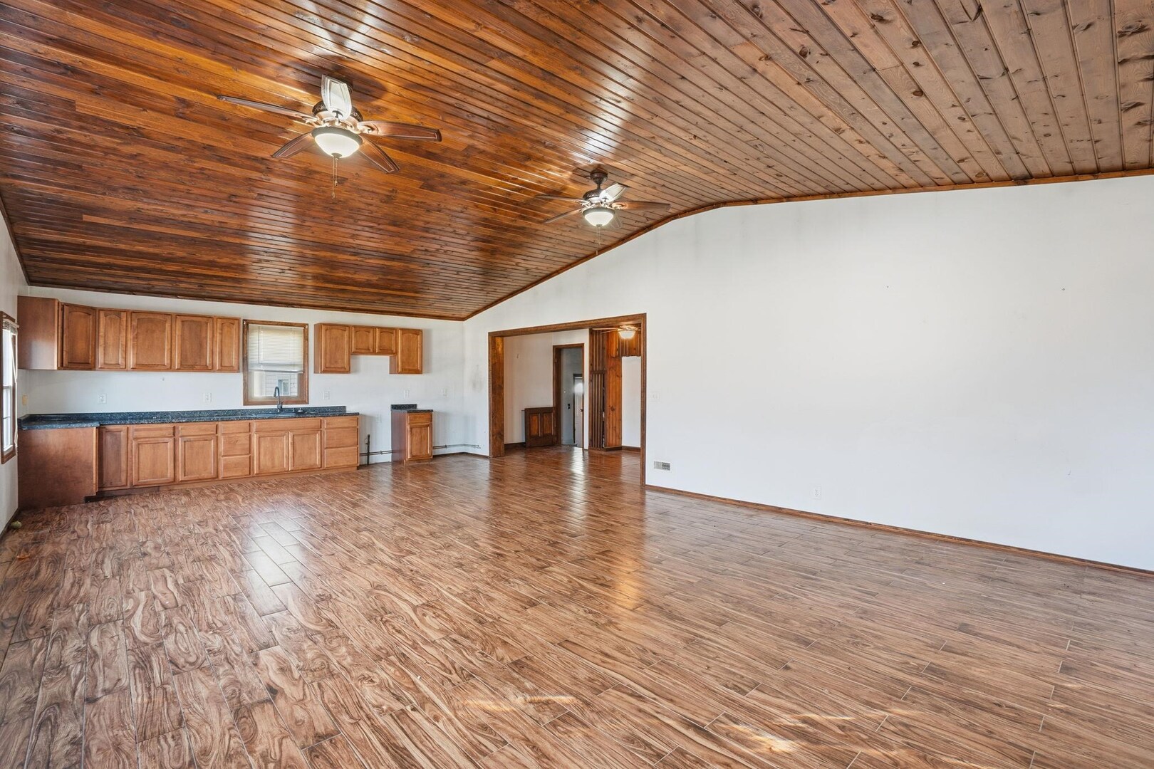 5029 69th Avenue Milan, IL 61264 - Photo 7 of 25 a view of a livingroom with wooden floor