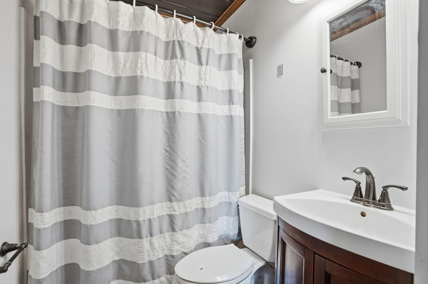 5029 69th Avenue Milan, IL 61264 - Photo 9 of 25 a bathroom with a sink toilet and shower