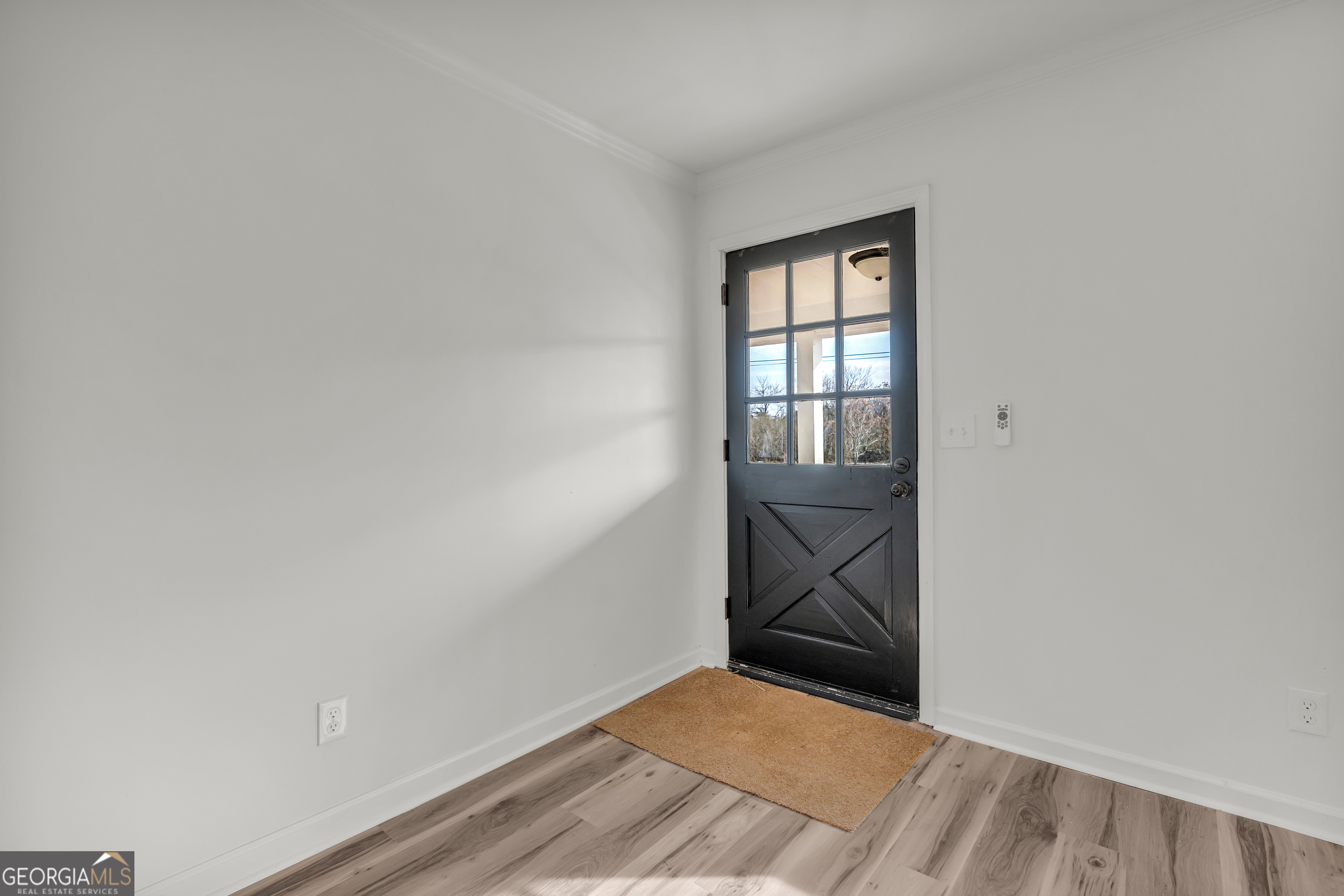 1160 Planing Mill Road Greensboro, GA 30642 - Photo 24 of 76 a view of an empty room and window