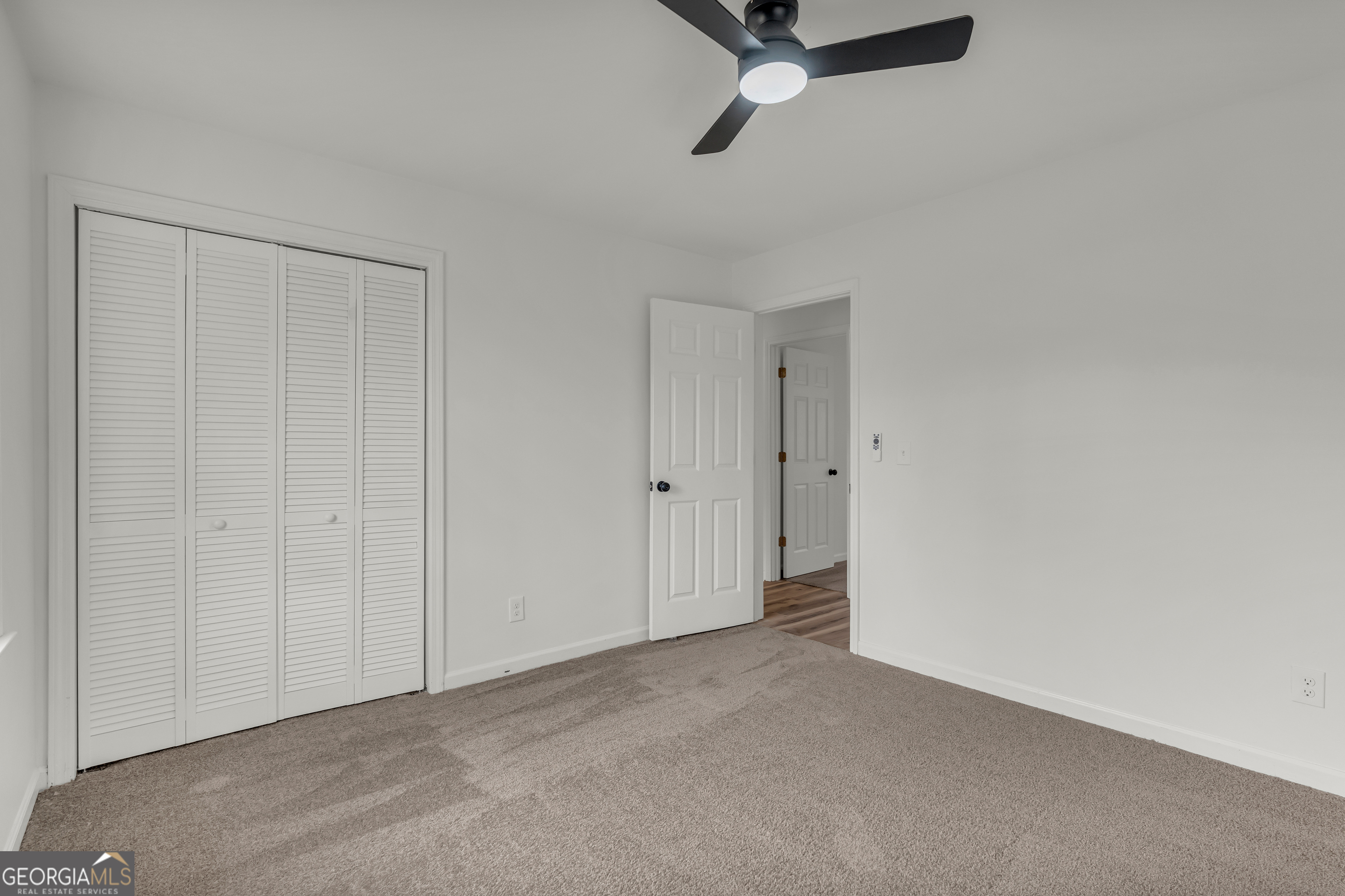 1160 Planing Mill Road Greensboro, GA 30642 - Photo 42 of 76 a view of a room with a ceiling fan