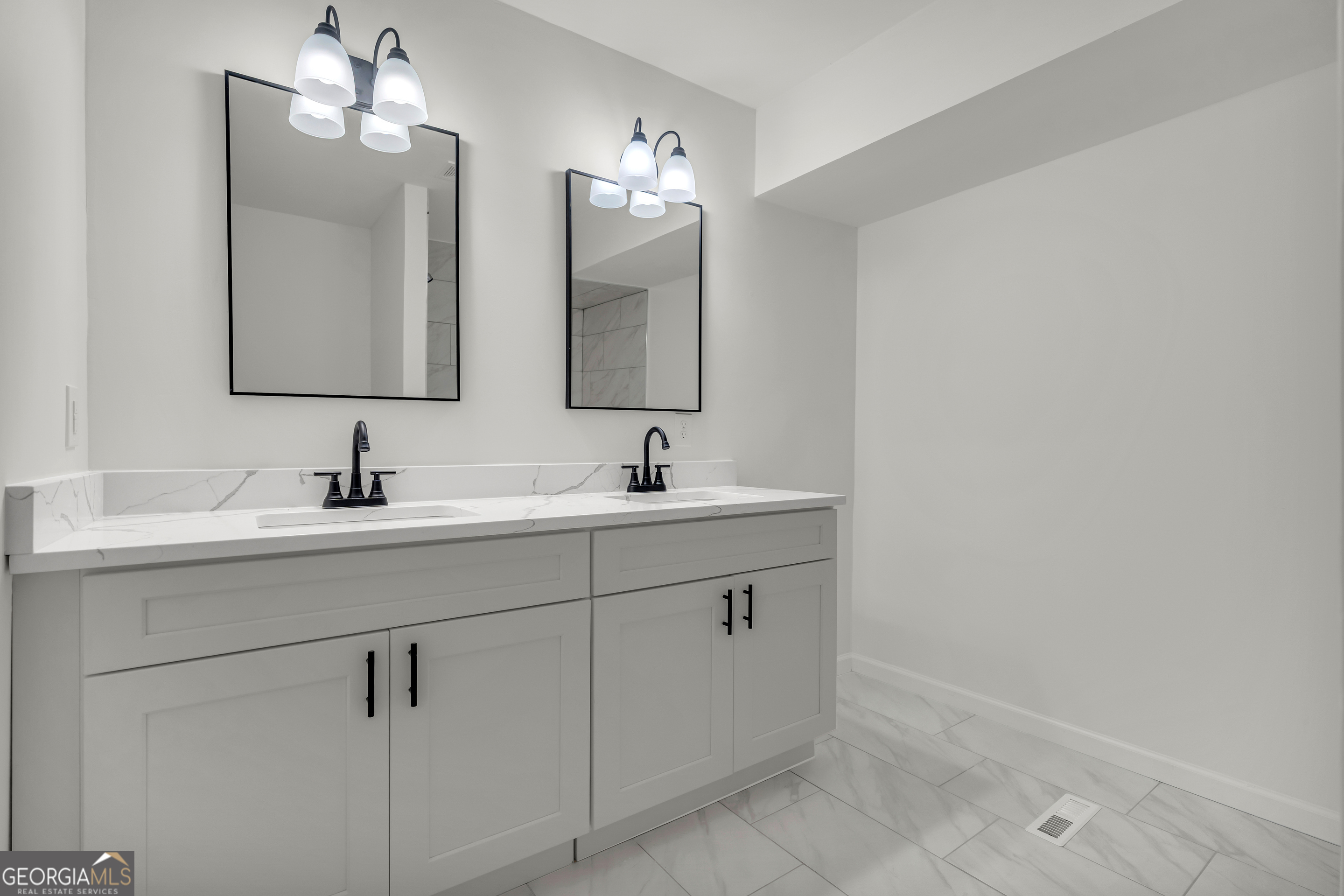 1160 Planing Mill Road Greensboro, GA 30642 - Photo 56 of 76 a bathroom with a double vanity sink mirror and