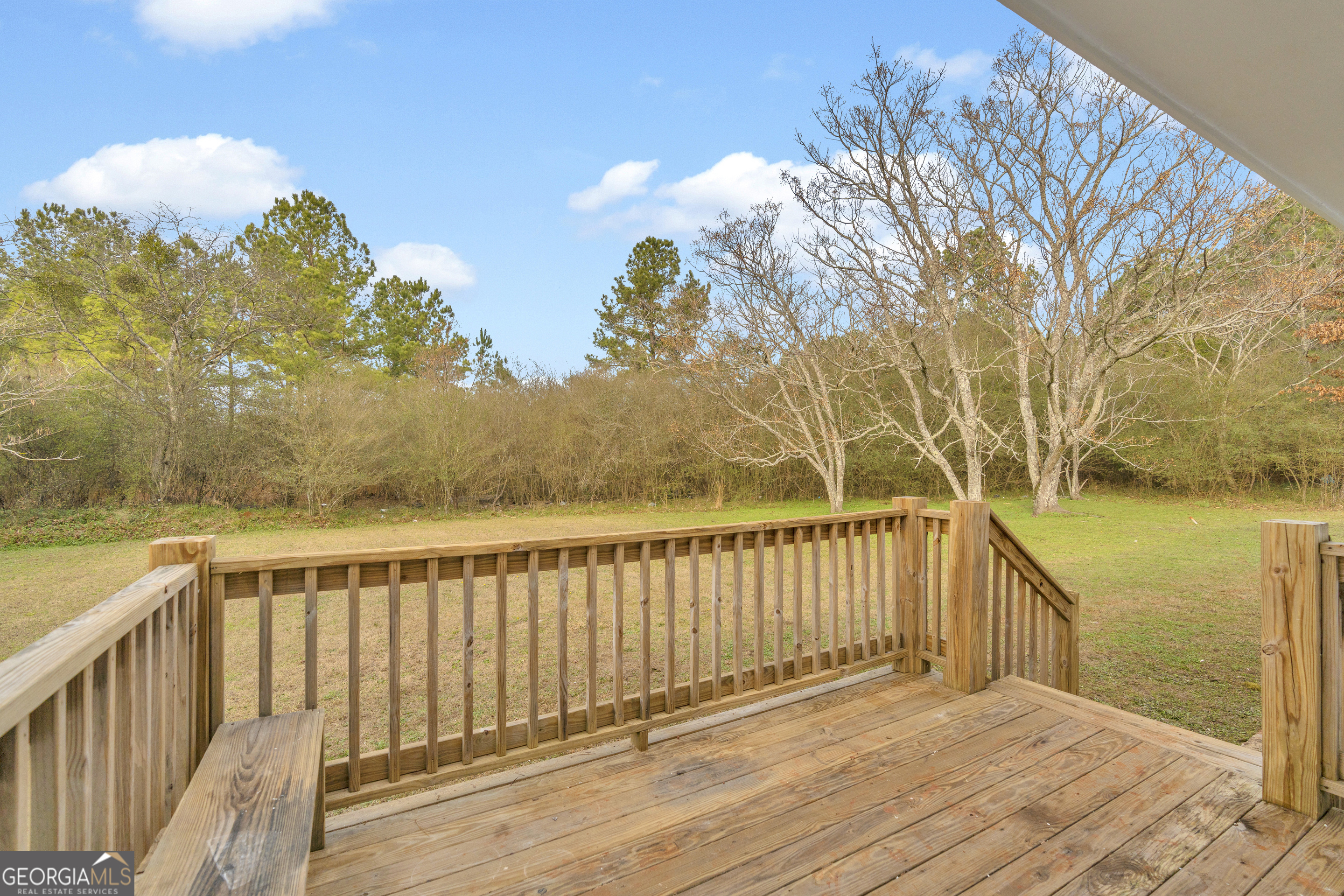 1160 Planing Mill Road Greensboro, GA 30642 - Photo 62 of 76 a view of wooden balcony with outdoor space
