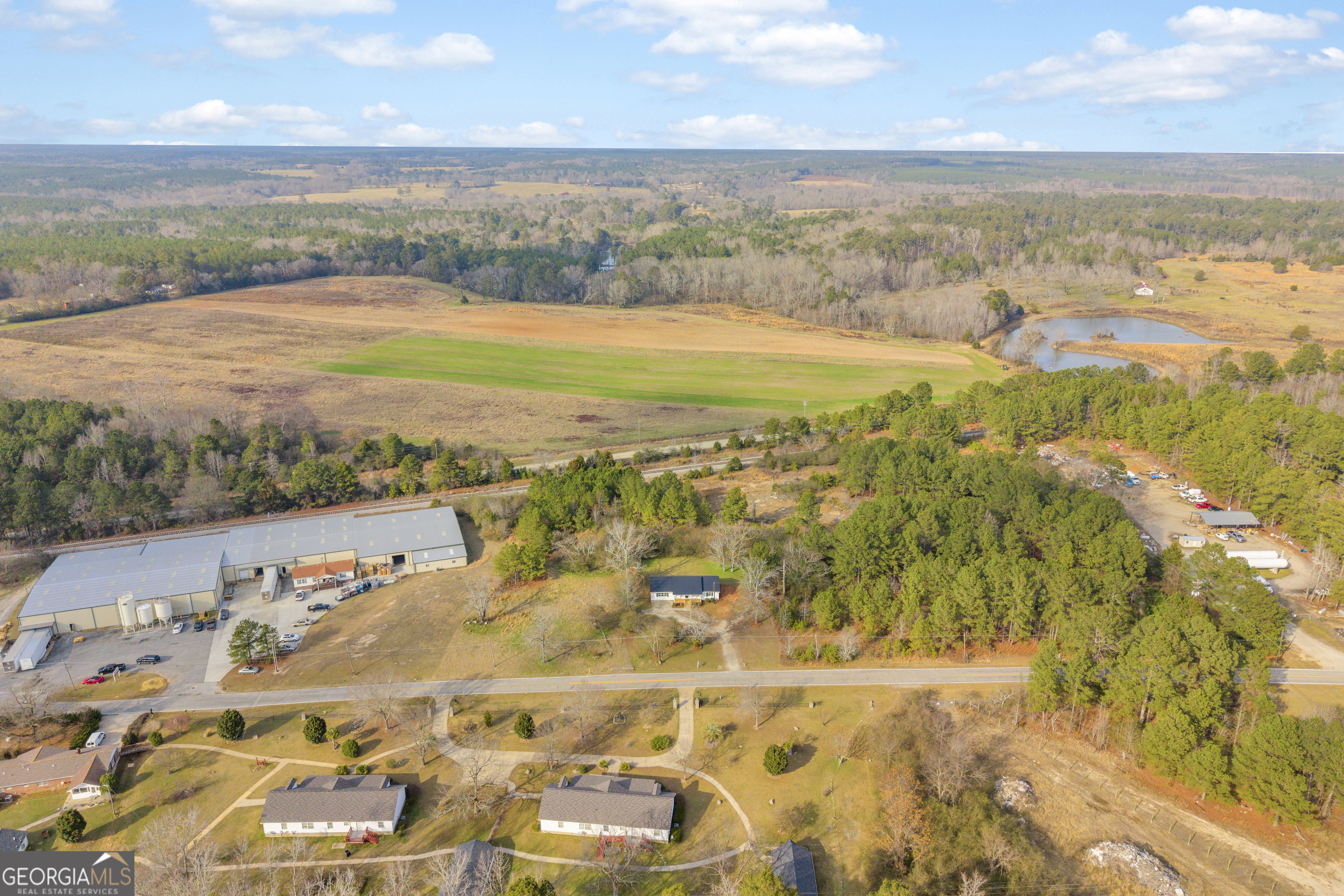 1160 Planing Mill Road Greensboro, GA 30642 - Photo 66 of 76 an aerial view of ocean and residential houses with outdoor space