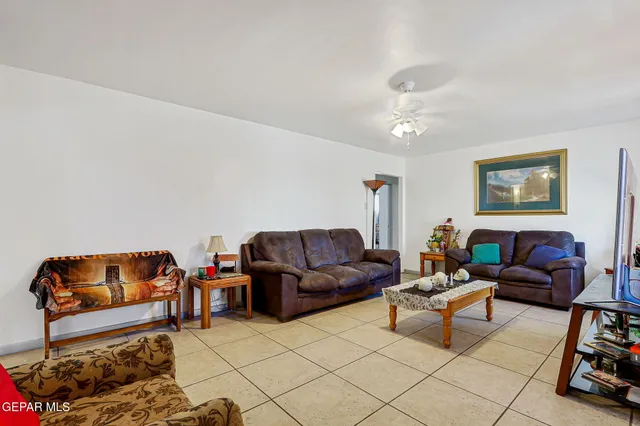 a living room with furniture and a couch