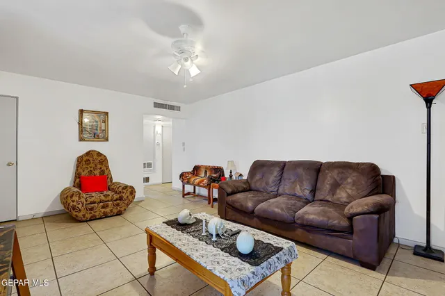 a living room with furniture and a couch