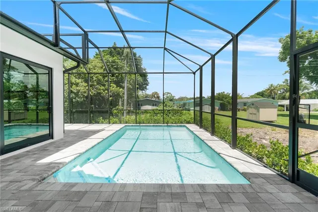 a view of interior space with swimming pool