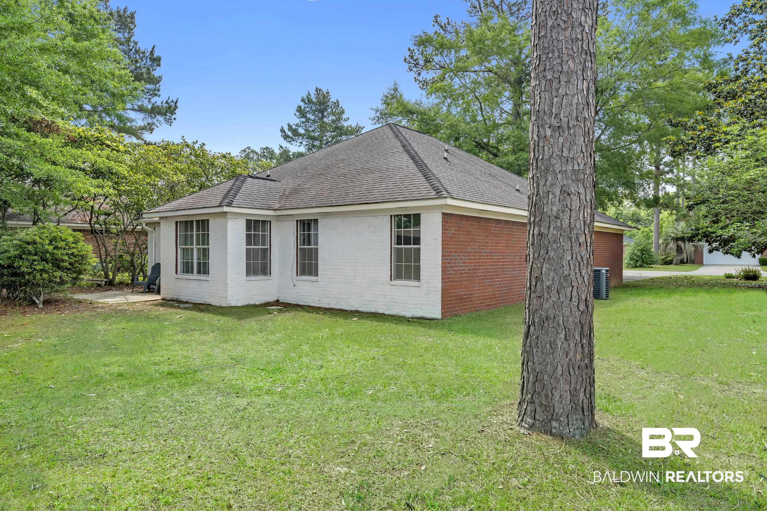 509 Loblolly Court Foley, AL 36535 - Photo 22 of 26 Single-story residence featuring a mixed white painted brick and red brick exterior