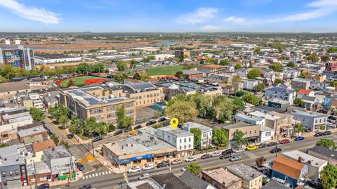 an aerial view of a city with lots of residential buildings