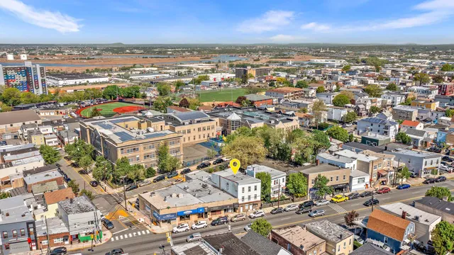 an aerial view of a city with lots of residential buildings