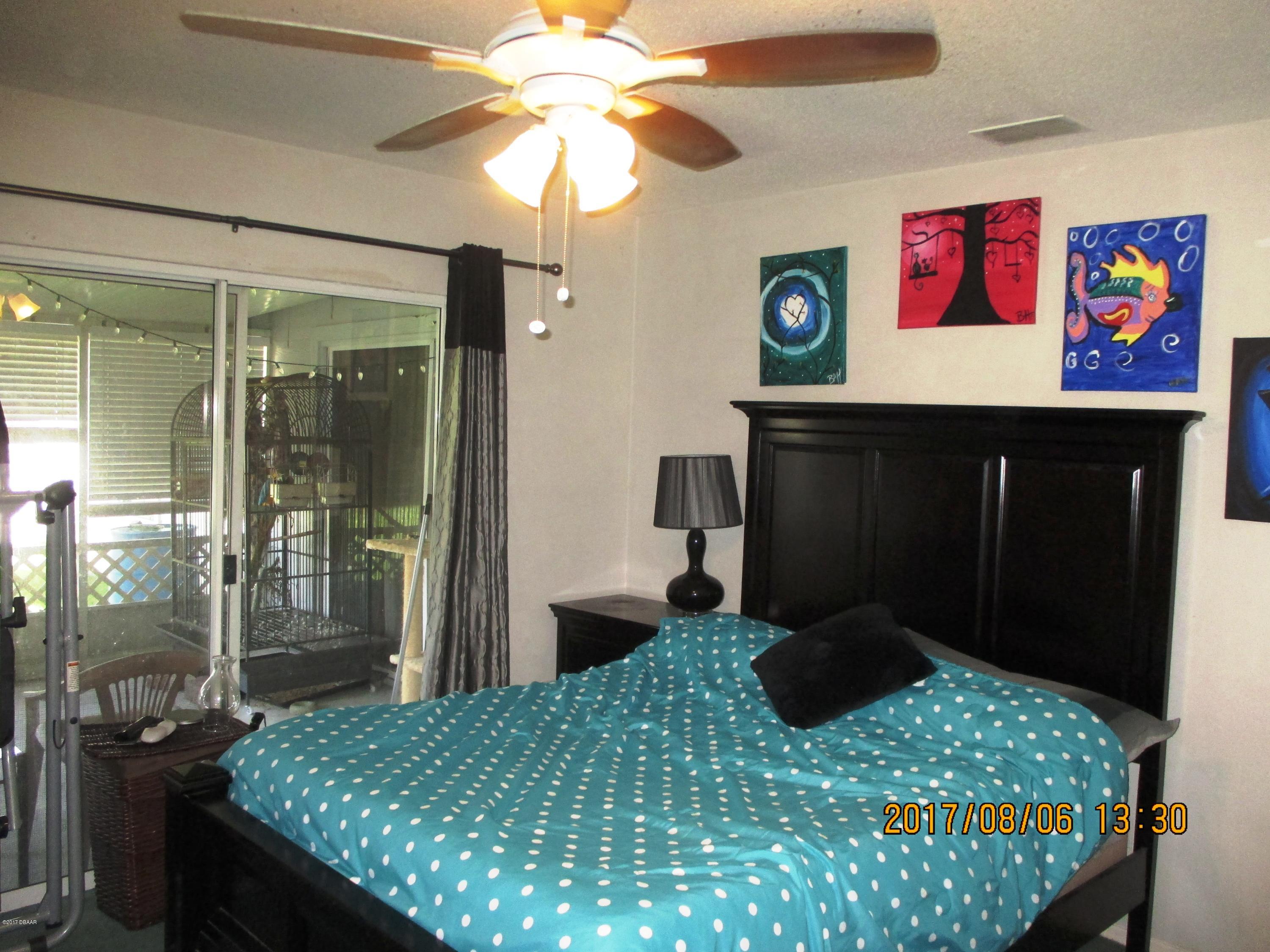 976 Deer Springs Road Port Orange, FL 32129 - Photo 13 of 24 Master room sliders