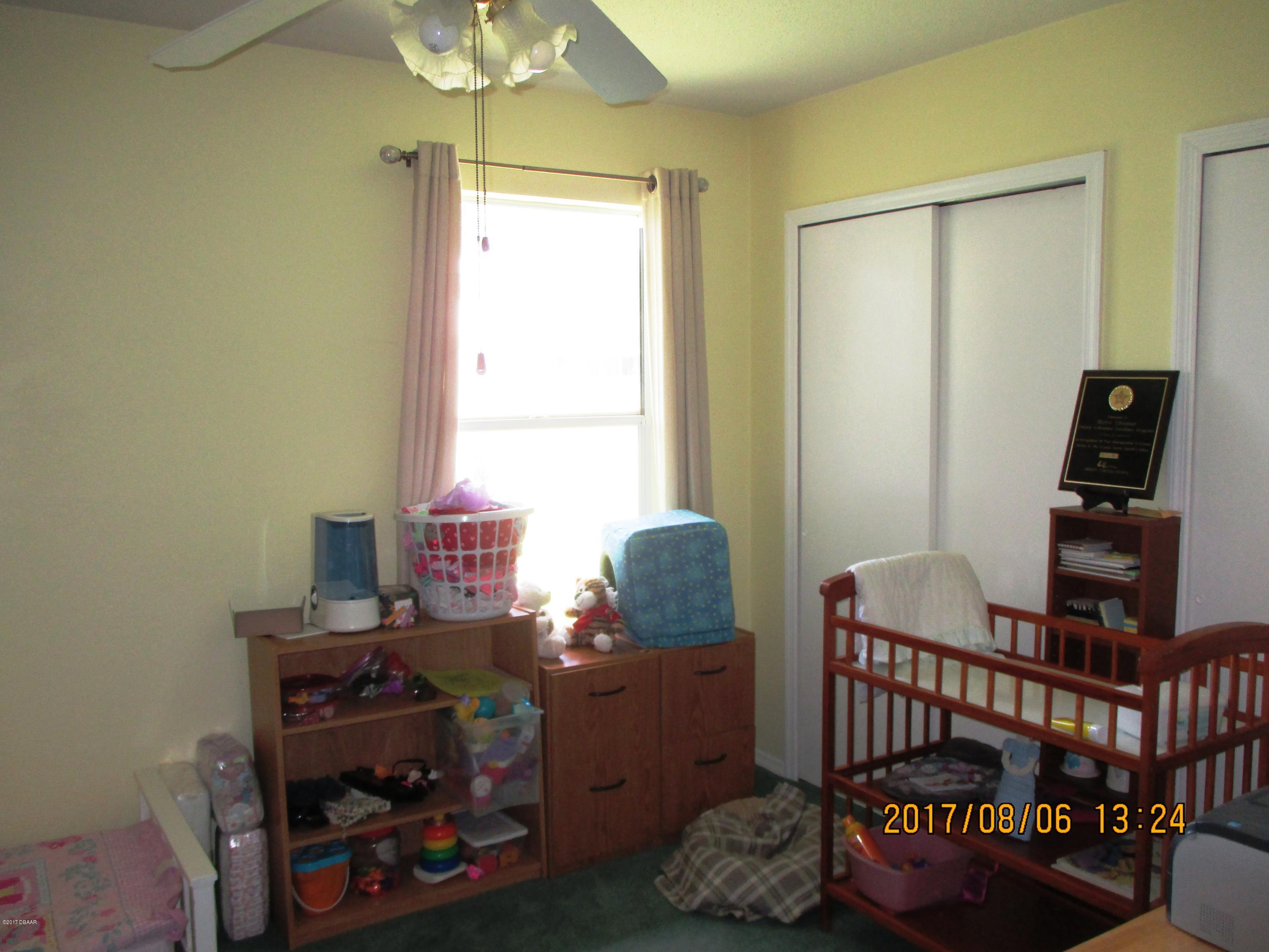 976 Deer Springs Road Port Orange, FL 32129 - Photo 21 of 24 Guest bedroom2