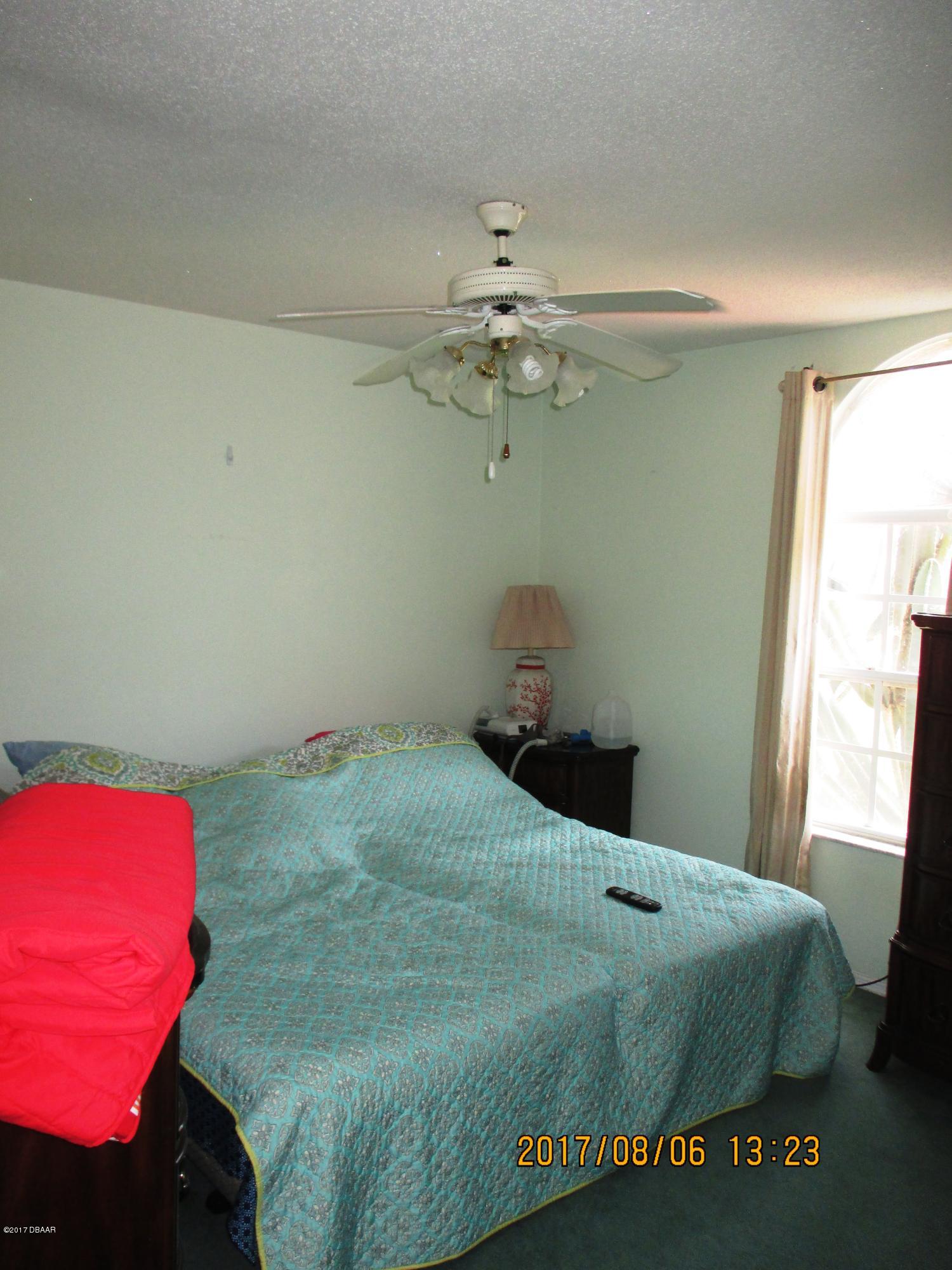 976 Deer Springs Road Port Orange, FL 32129 - Photo 23 of 24 Guest bedroom