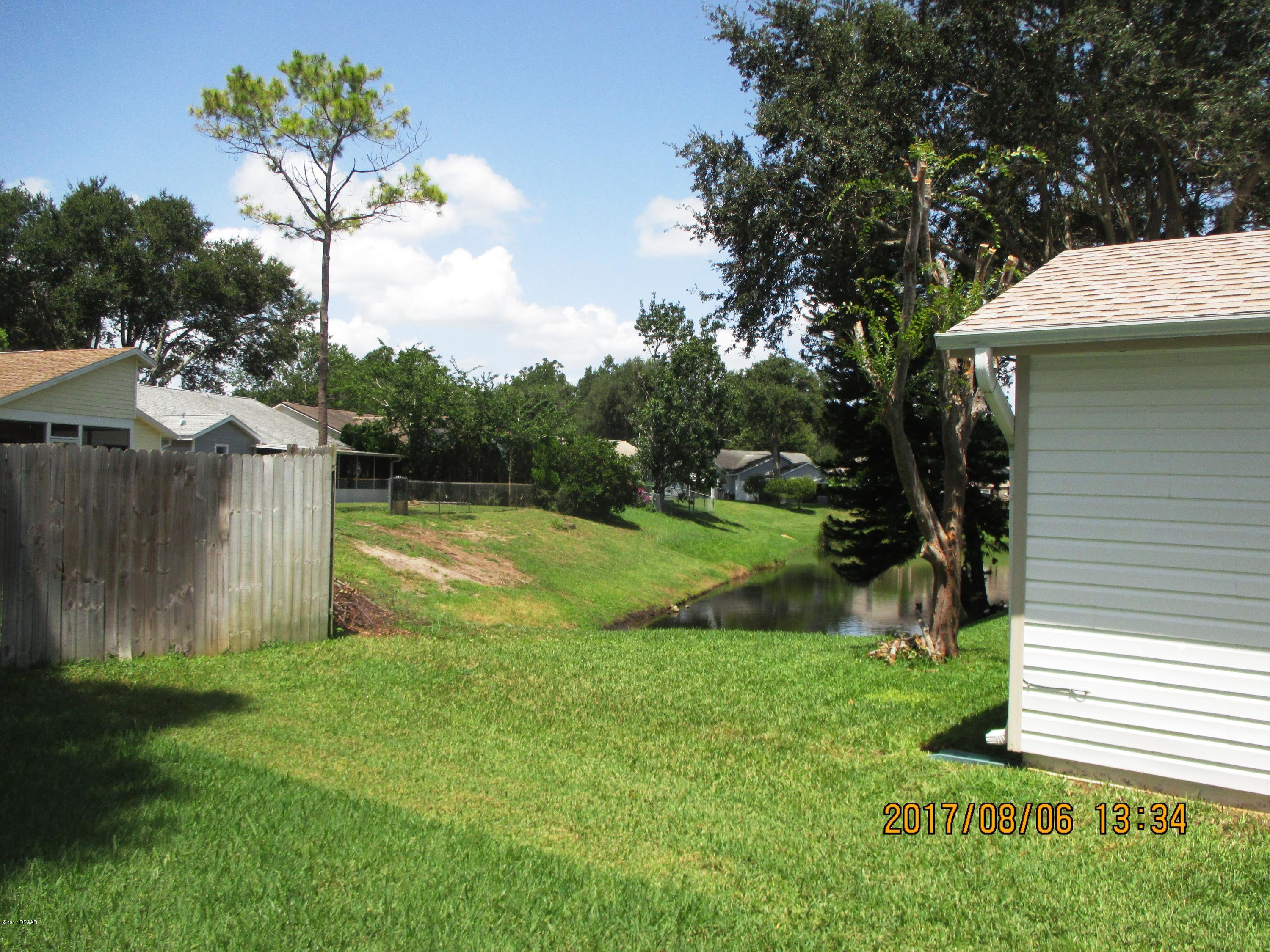 976 Deer Springs Road Port Orange, FL 32129 - Photo 8 of 24 Canal view
