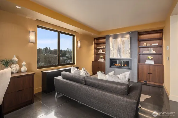 a spacious bedroom with a large bed and a large window