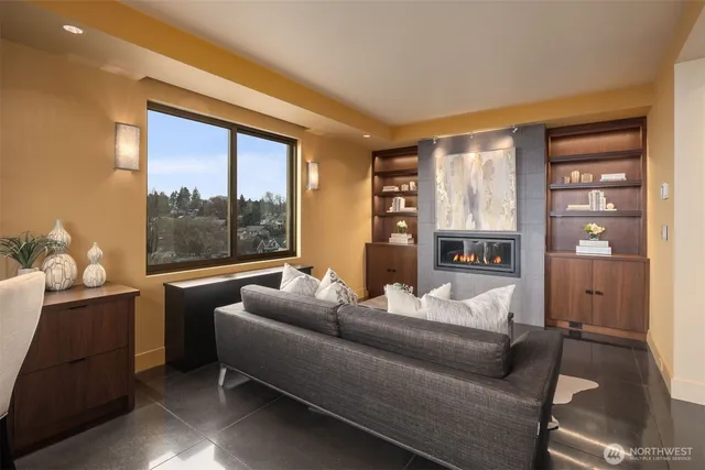 a spacious bedroom with a large bed and a large window