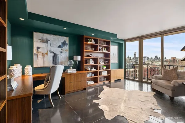 a view of a balcony with chairs