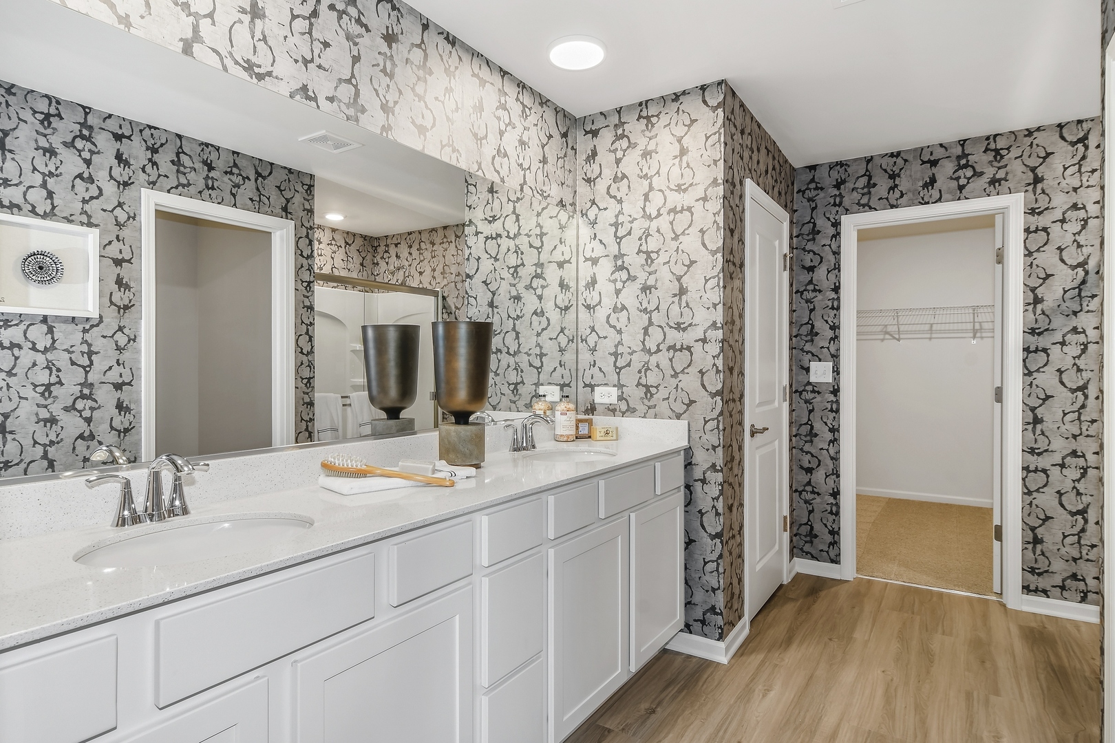 16249 Longcommon Lane Plainfield, IL 60586 - Photo 14 of 27 a bathroom with a double vanity sink mirror and shower