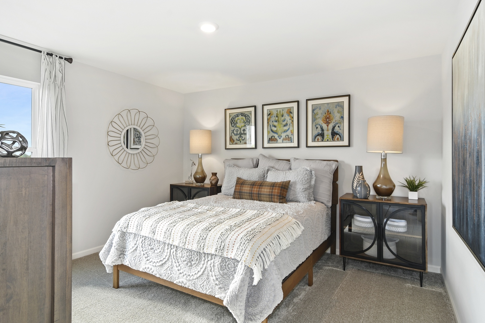 16249 Longcommon Lane Plainfield, IL 60586 - Photo 16 of 27 a bedroom with a bed lamp and a window