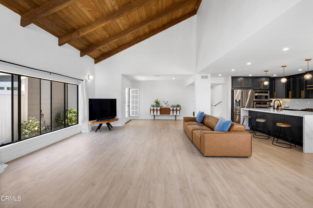 3960 West Hemlock Street Oxnard, CA 93035 - Photo 13 of 42 a living room with furniture and a flat screen tv