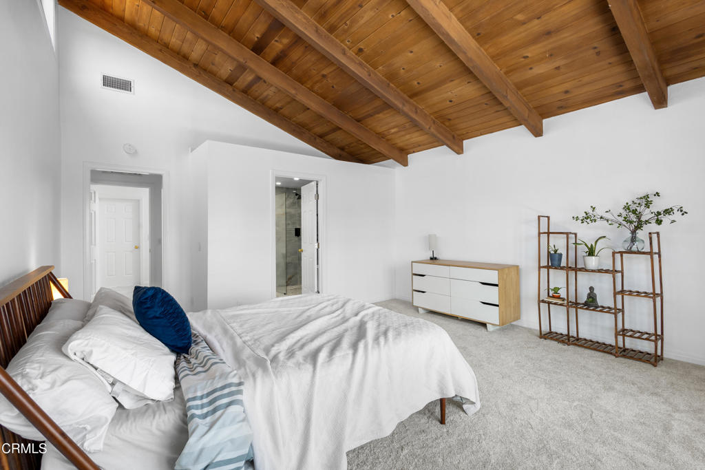 3960 West Hemlock Street Oxnard, CA 93035 - Photo 16 of 42 a bedroom with a bed and a walk in closet