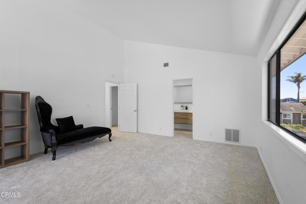 3960 West Hemlock Street Oxnard, CA 93035 - Photo 20 of 42 a living room with furniture and a dresser