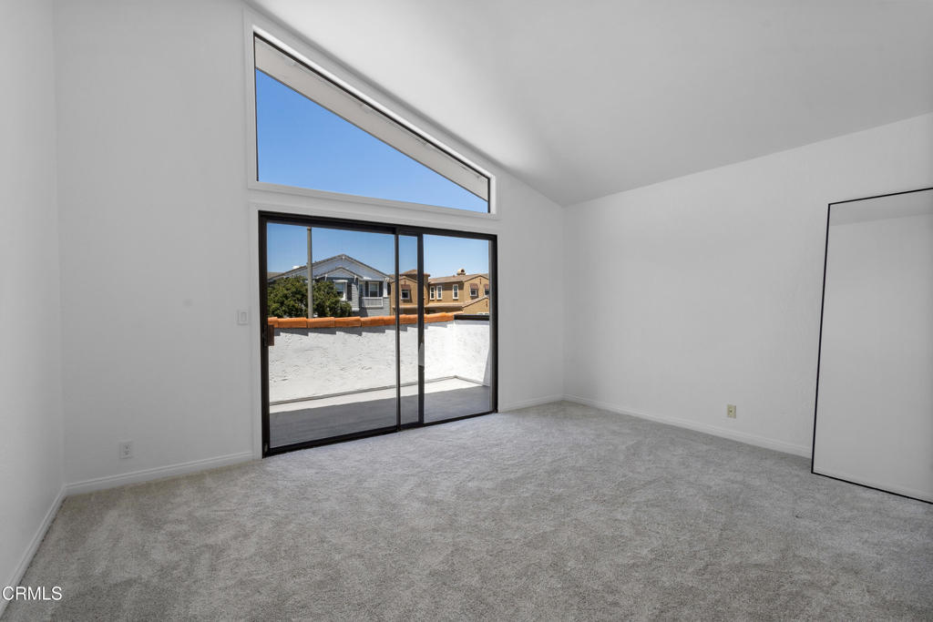 3960 West Hemlock Street Oxnard, CA 93035 - Photo 21 of 42 a view of an empty room with a window