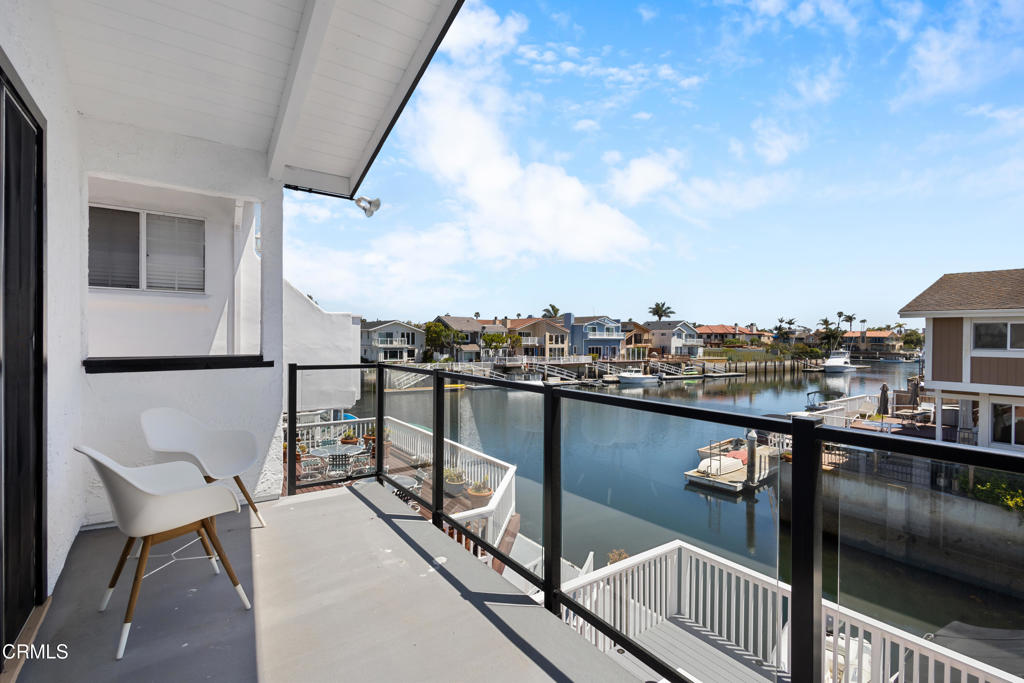 3960 West Hemlock Street Oxnard, CA 93035 - Photo 26 of 42 a view of a balcony with two chairs