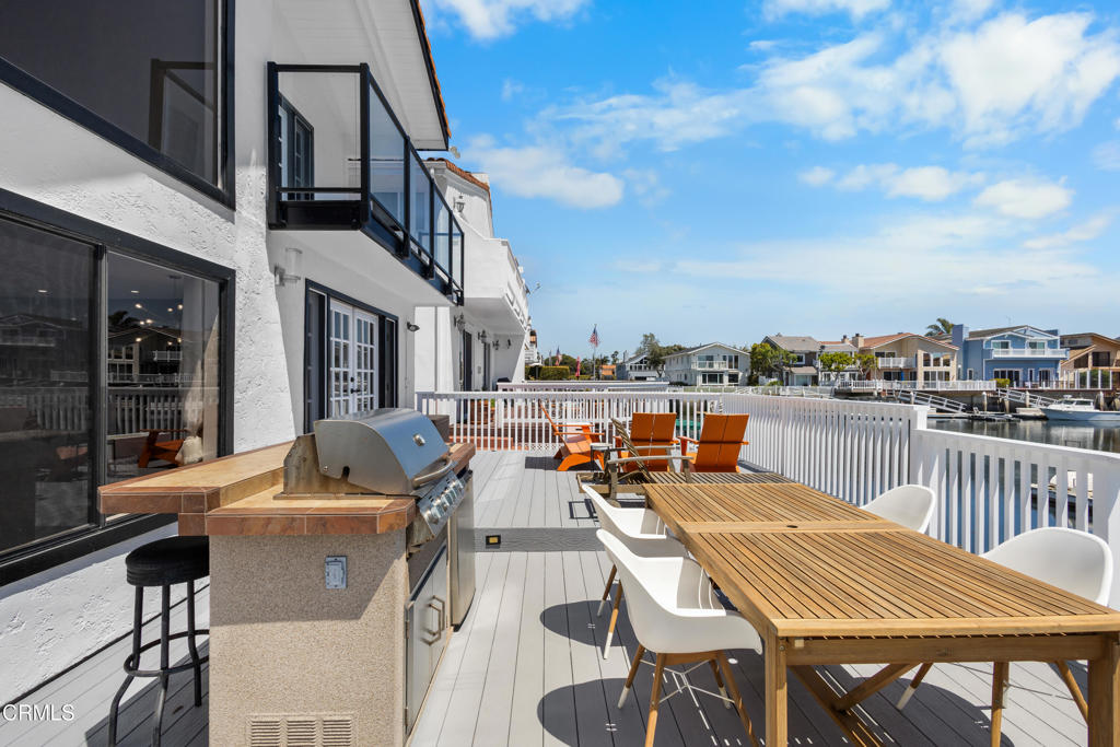 3960 West Hemlock Street Oxnard, CA 93035 - Photo 29 of 42 a view of a roof deck with furniture