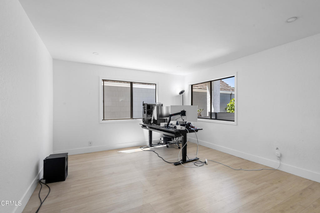 3960 West Hemlock Street Oxnard, CA 93035 - Photo 36 of 42 a view of a workspace with furniture and a window
