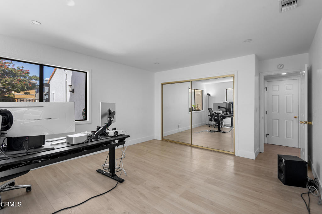 3960 West Hemlock Street Oxnard, CA 93035 - Photo 37 of 42 a view of a livingroom with furniture and a flat screen tv