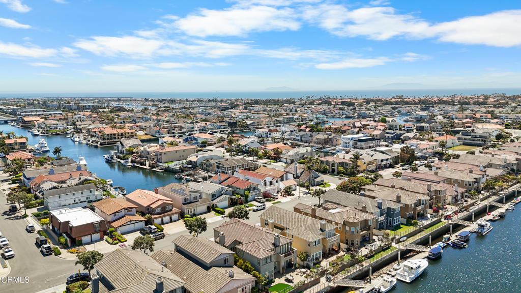3960 West Hemlock Street Oxnard, CA 93035 - Photo 4 of 42 an aerial view of a city with lots of residential buildings