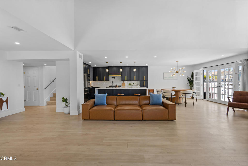3960 West Hemlock Street Oxnard, CA 93035 - Photo 6 of 42 a living room with furniture and kitchen view