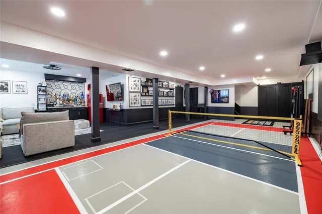 a room with furniture and air hockey table