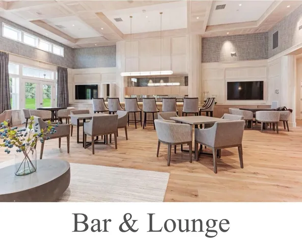 a living room with lots of furniture a flat screen tv and a large window