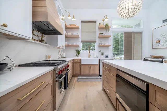 a kitchen with a stove and a sink