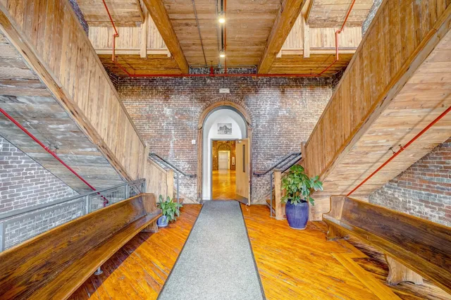 a view of a staircase with a small yard