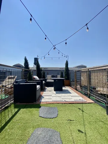 a view of a backyard with a patio
