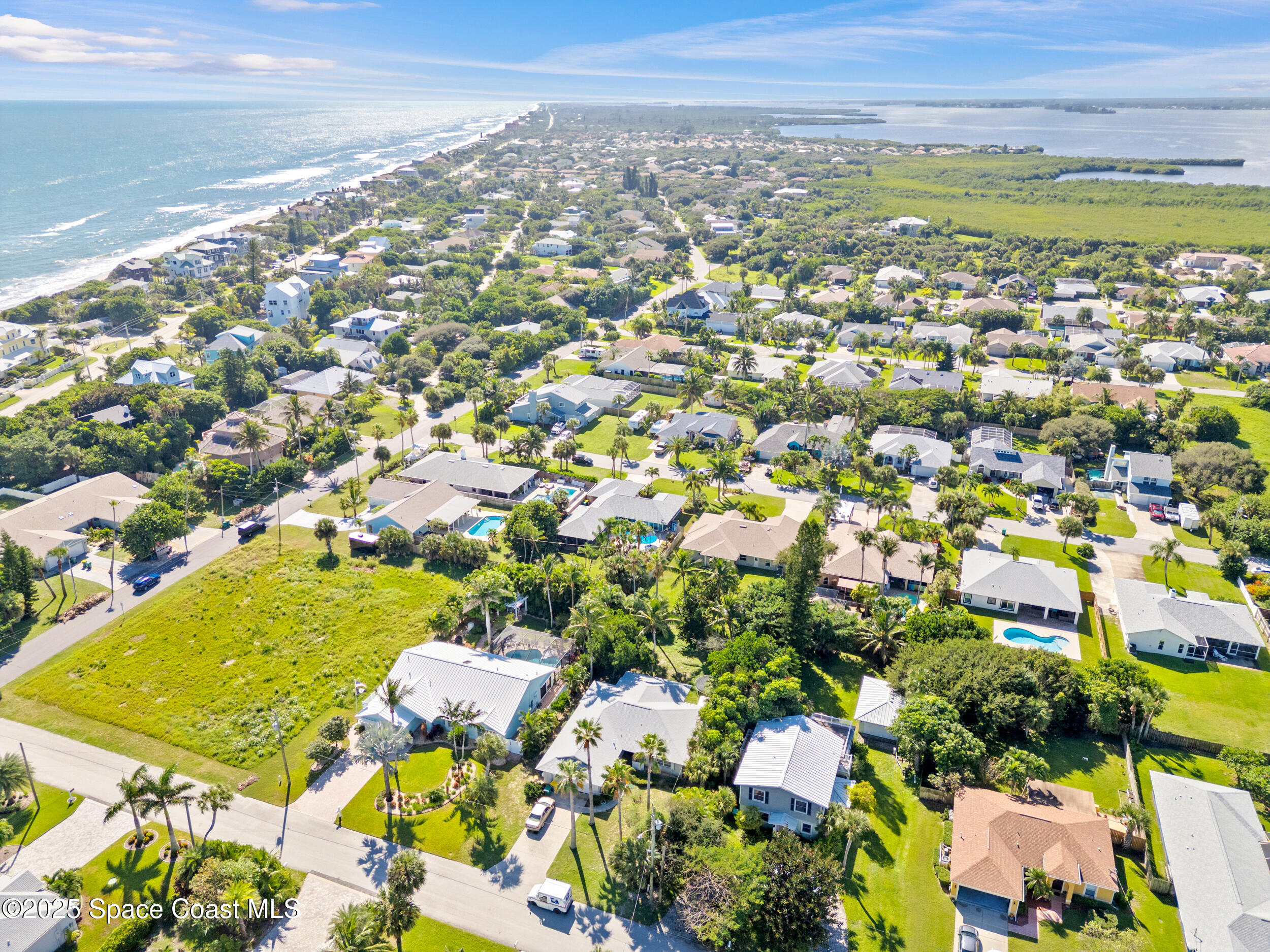 230 Riggs Avenue Melbourne Beach, FL 32951 - Photo 34 of 38 a view of a city