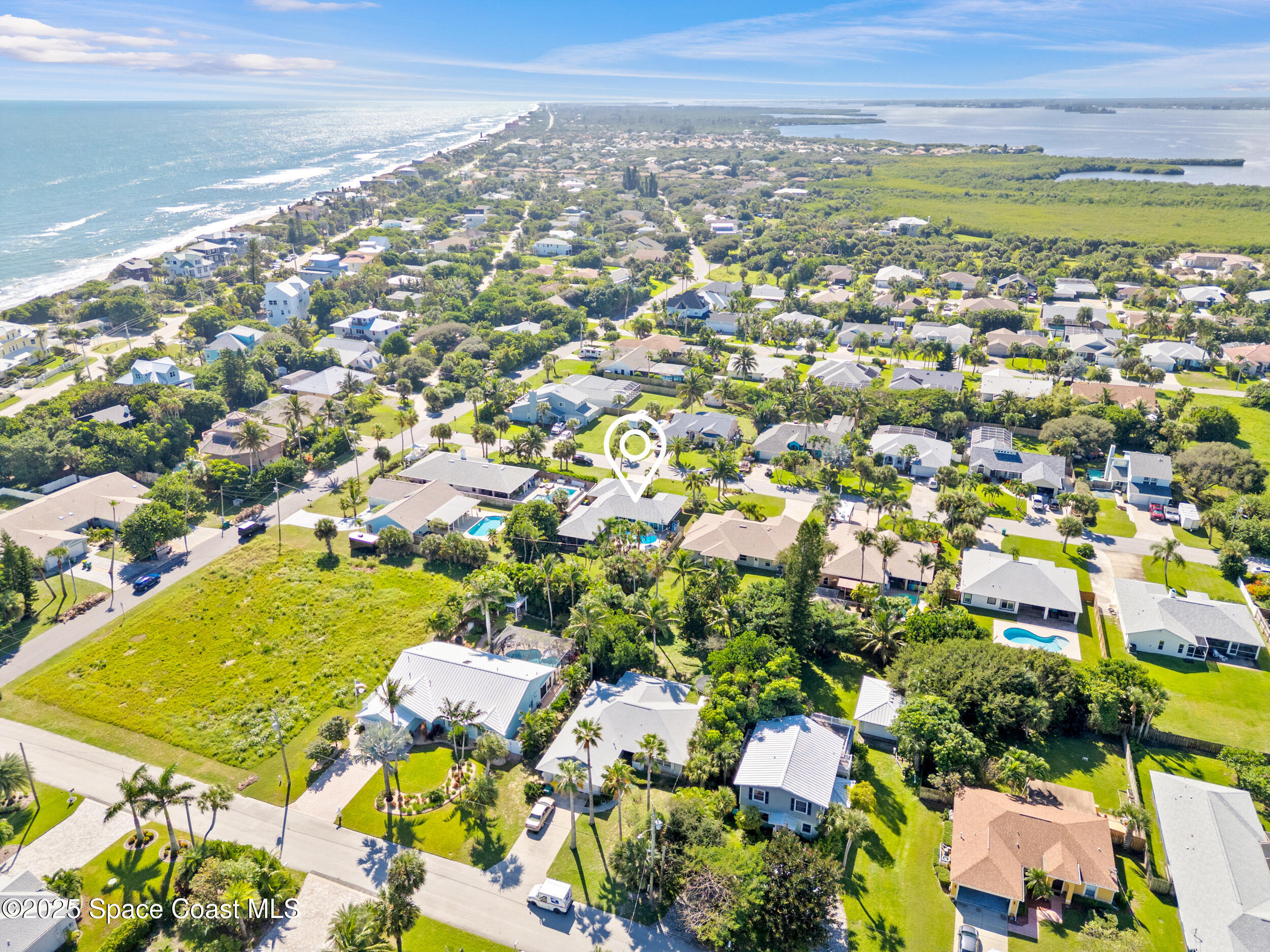 230 Riggs Avenue Melbourne Beach, FL 32951 - Photo 35 of 38 a view of a city