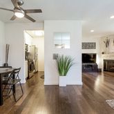 a view of a livingroom with furniture and a fireplace