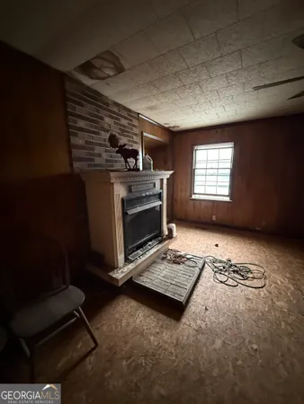 a view of an empty room and window