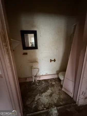 a view of a room with a lot of cabinets