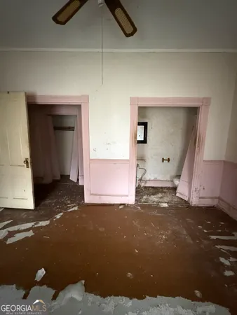 a view of an empty room and window