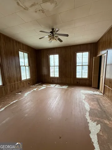 a view of a livingroom with a staircase