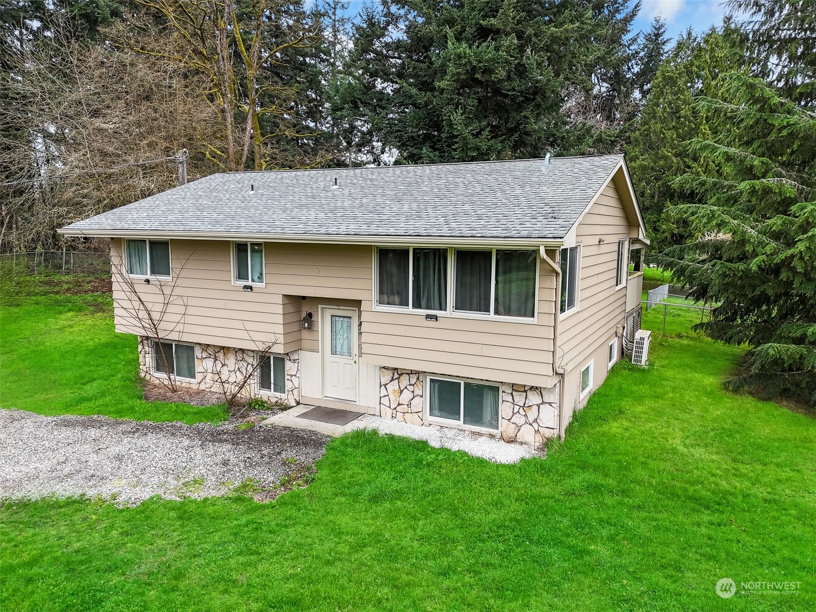 a house view with a garden space