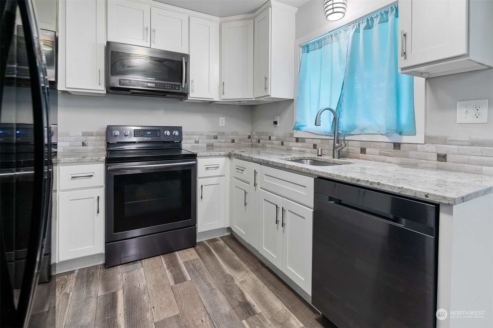 730 Tipsoo Loop South Rainier, WA 98576 - Photo 11 of 35 a kitchen with a stove and a sink