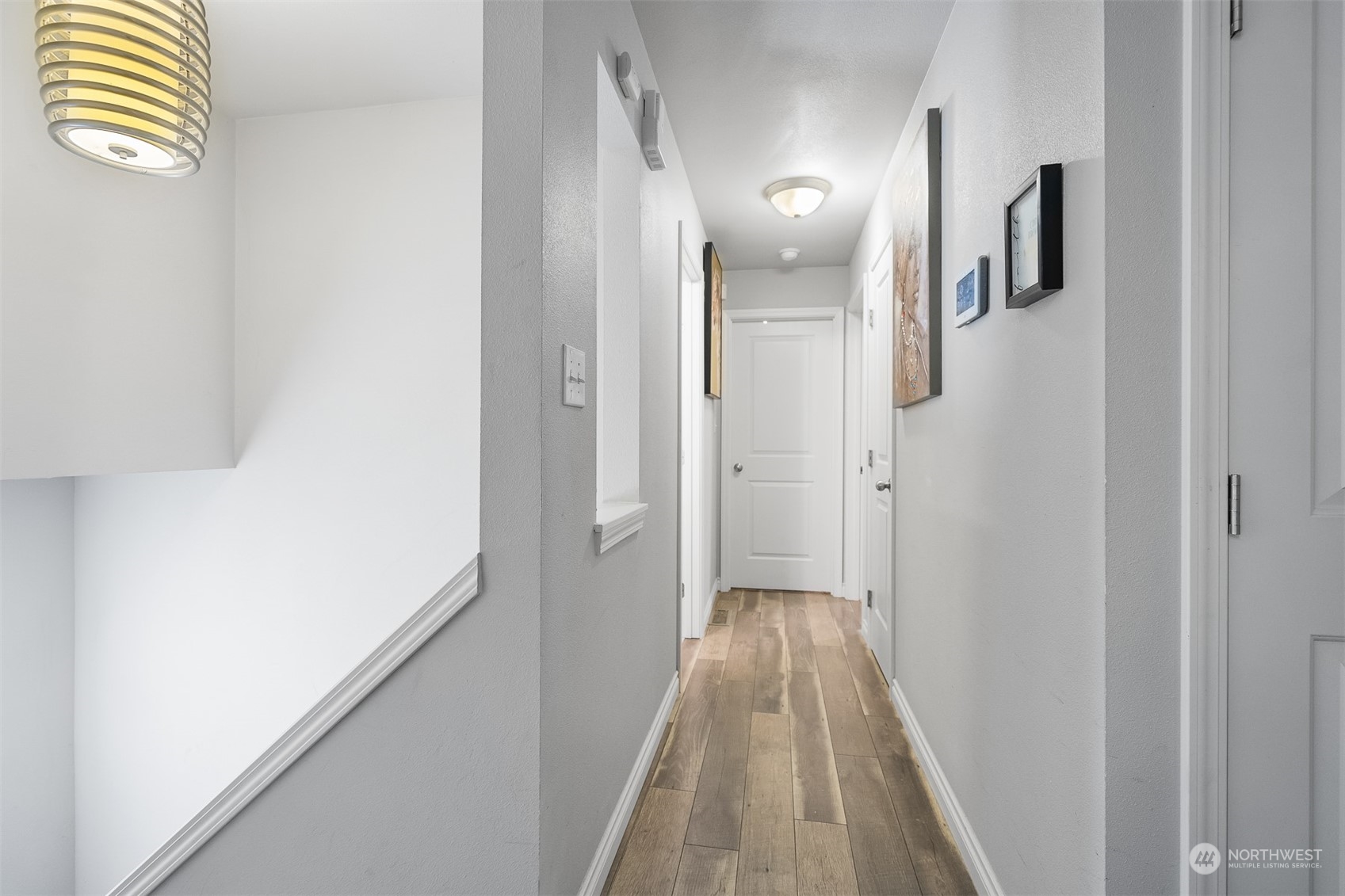 730 Tipsoo Loop South Rainier, WA 98576 - Photo 14 of 35 a view of a hallway with wooden floor