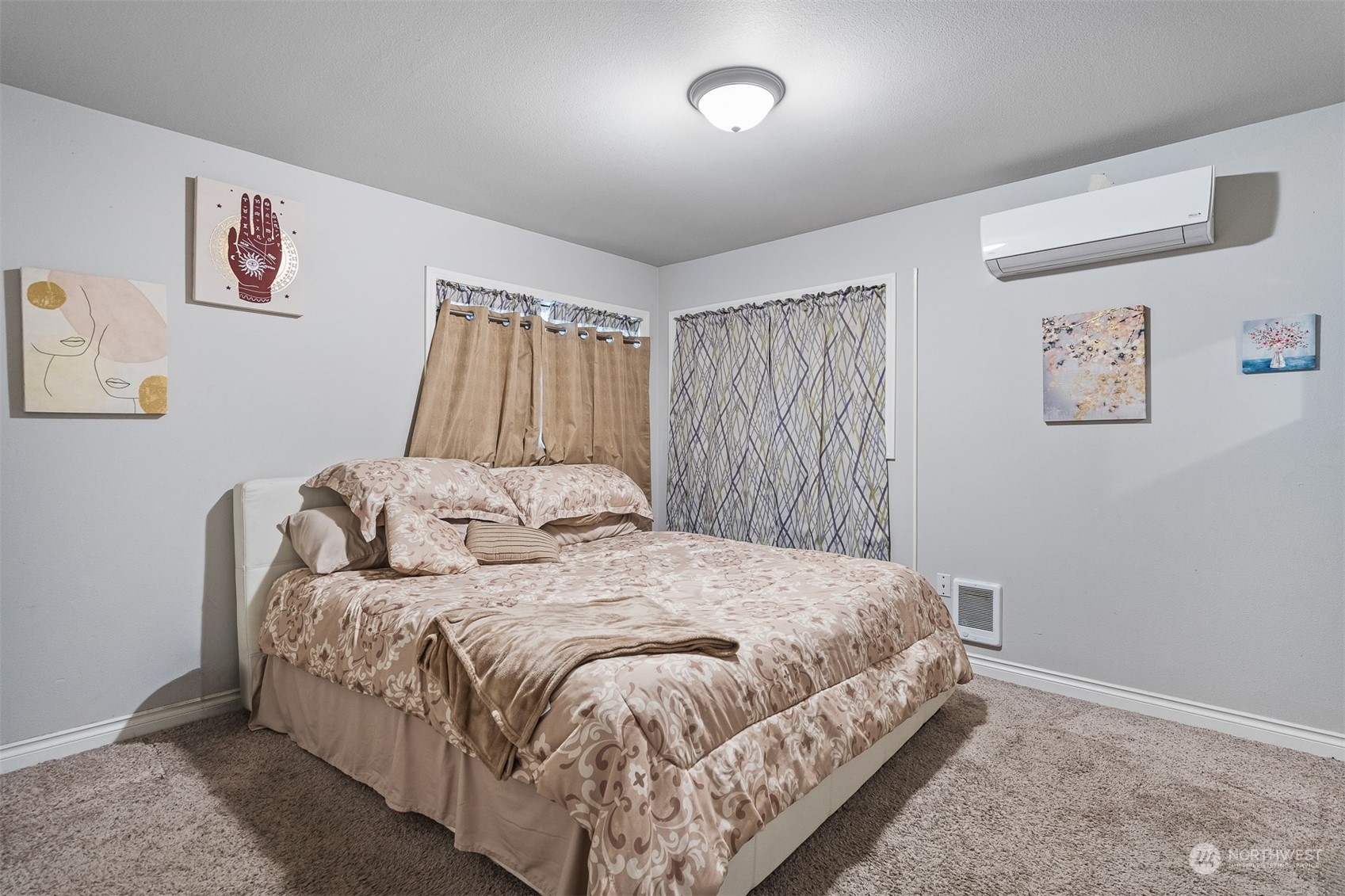 730 Tipsoo Loop South Rainier, WA 98576 - Photo 15 of 35 a bed room with a bed and painting on the wall